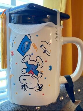 Rae Dunn White Ceramic Snoopy Graduation Mug with Blue Lid and Yellow Tassel